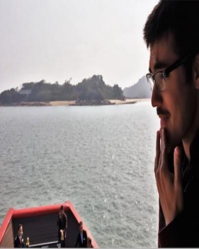 Image of Niall Chithelen on a boat